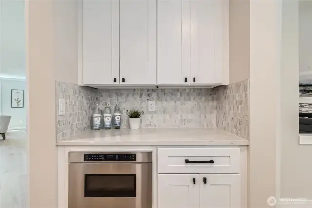 Additional cabinets and pull out microwave.