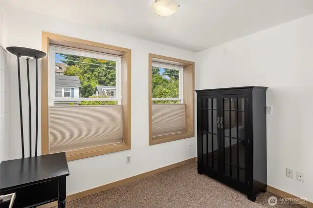 This is the ADDITIONAL office across the hall. Two large windows overlooking Bigelow. Could be an in-home office, personal gym, or even more storage!
