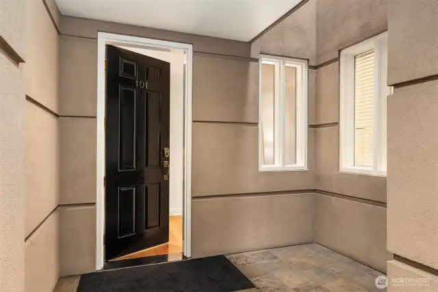 This is the private entrance to this one-story home, just steps from the elevator directly to the secure garage.