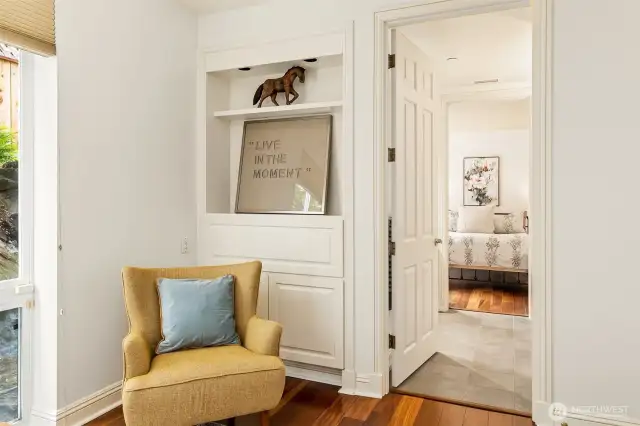 Built in storage and entrance to the shared, continental bath.