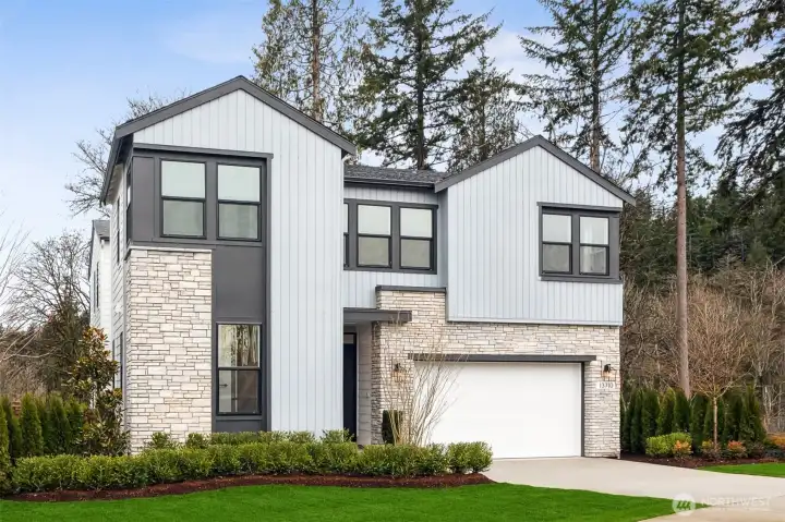 This is a photo of a similar home in the community.  Please see rendering for specific exterior styling.