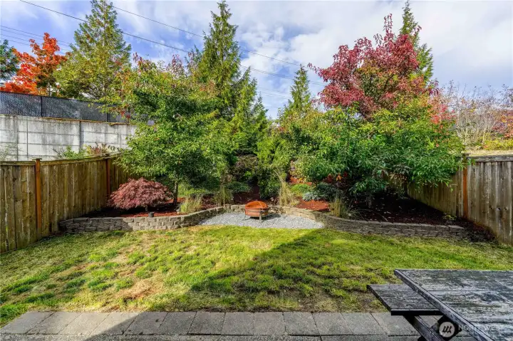 Professionally landscaped. Water feature attaches to natural water underneath (previous owner hooked up, current owner does not)