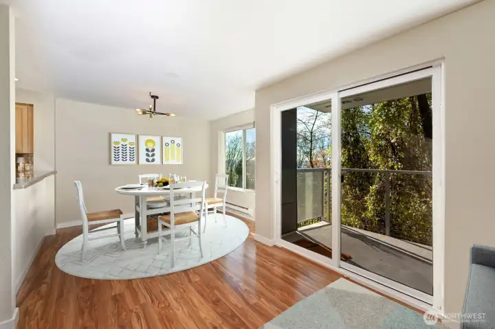 With dining room seating for four. Or add barstools at the kitchen counter for additional seating. (virtually staged)