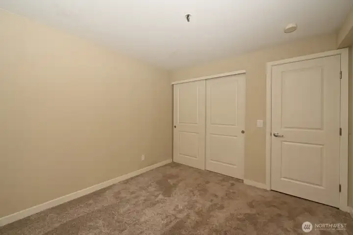 The second bedroom offers a 6' closet.