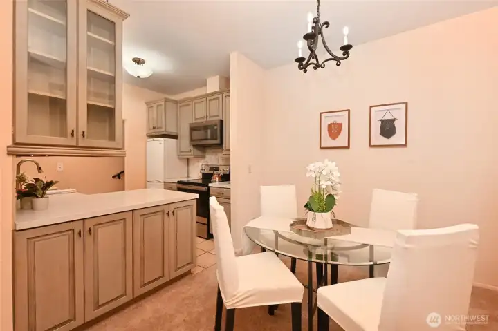 The dining room can accommodate a larger table and a buffet/hutch.