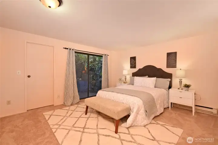 The large master bedroom suite opens onto a private patio.