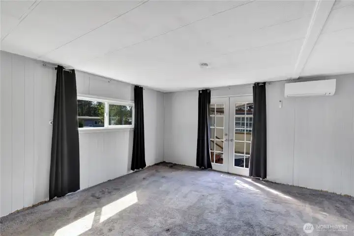 Curtains virtually staged - primary bedroom