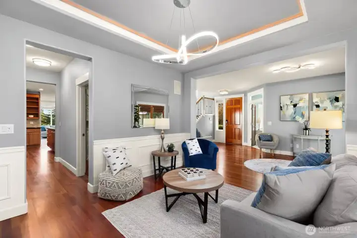 Beautifully updated light fixtures and paint.  Coved ceilings and extensive trim work throughout.