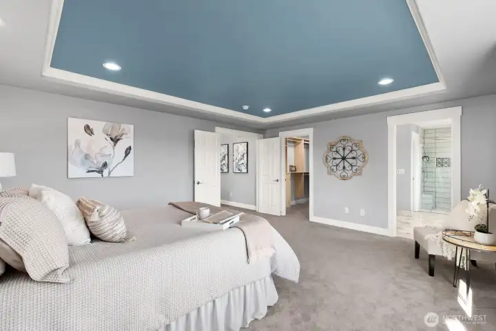 Primary bathroom and closet off bedroom.
