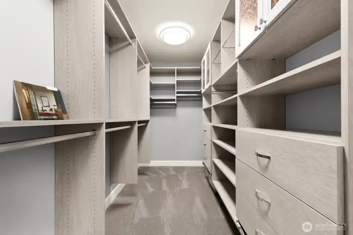 Primary closet with custom California Closets!