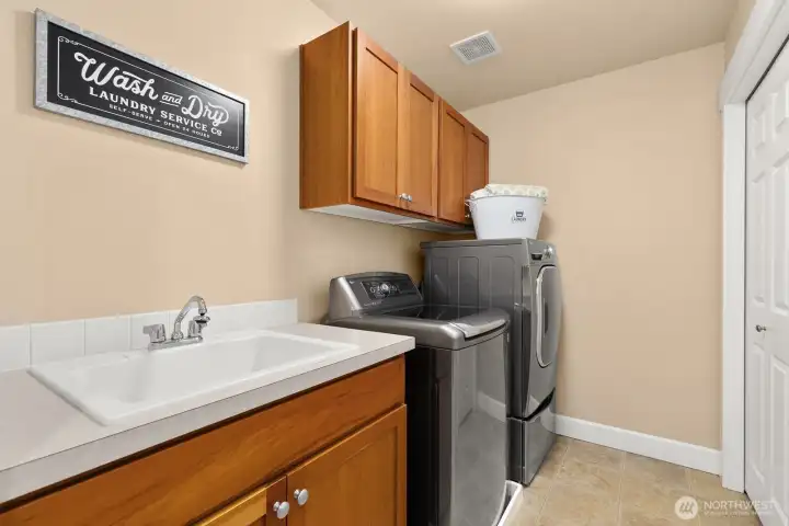 Upstairs laundry with storage!