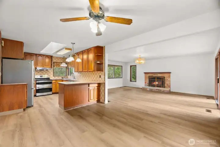 From Dining Space looking into Kitchen, and still having view of the fireplace
