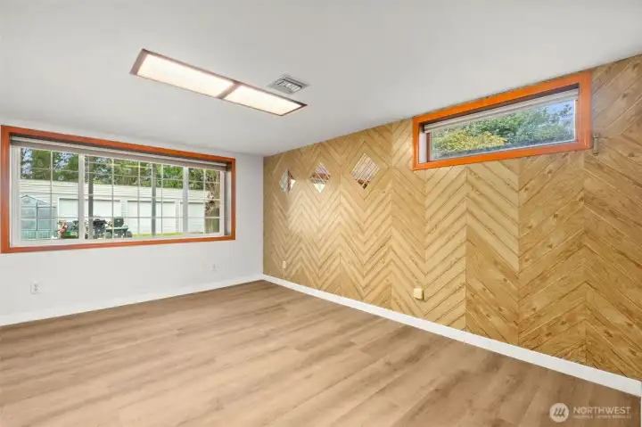 Lower floor HUGE bedroom, with window ledge nearly wide enough to sit in or set your plants