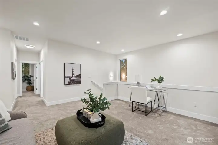 Large TV/Bonus area at the top of the stairs