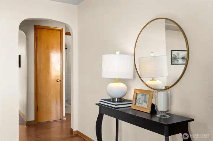 Gleaming hardwood floors greet you as you enter