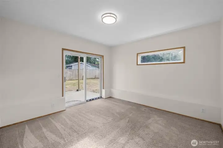 2nd Living Room/Bonus Room on Lower Floor with sliding glass door to backyard 2nd Living Room/Bonus Room on Lower Floor with sliding glass door to backyard
