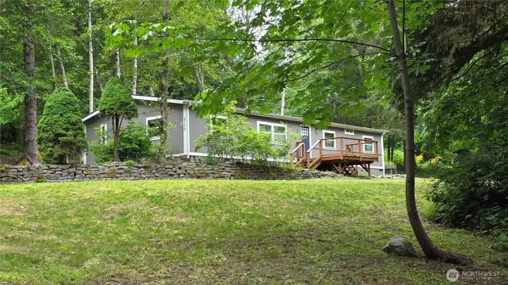 Parklike yard surrounds this beautifully updated home