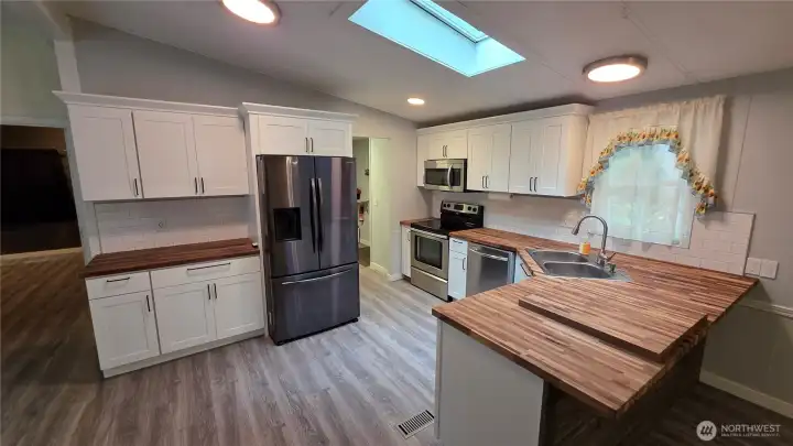 Large open kitchen accommodates many cooks & helpers