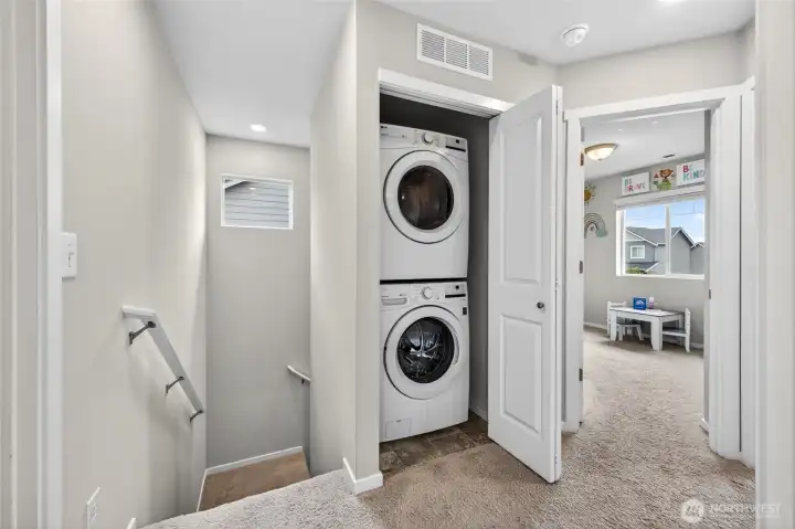 Laundry conveniently located upstairs near bedrooms.