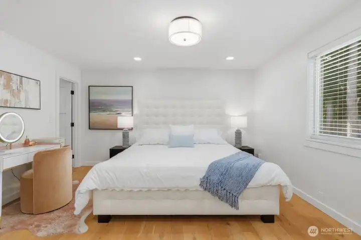Rejuvenate in the spacious primary suite, featuring a large walk-in closet and a beautifully appointed, spacious luxurious bath.