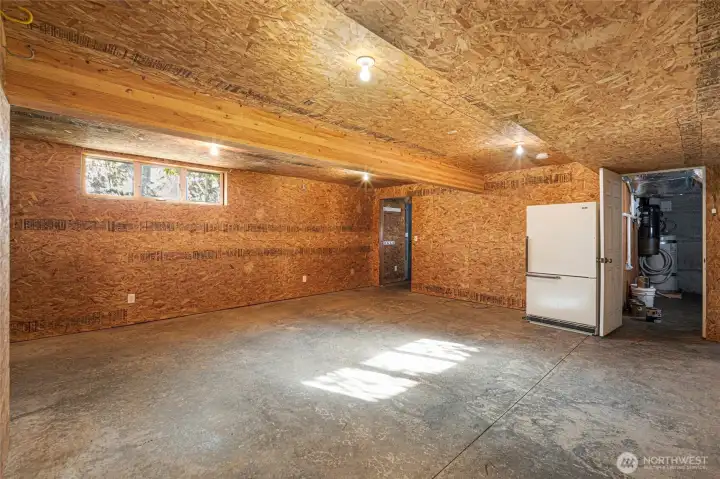 Huge amount of storage in basement, with multiple rooms accessed from the interior and exterior,