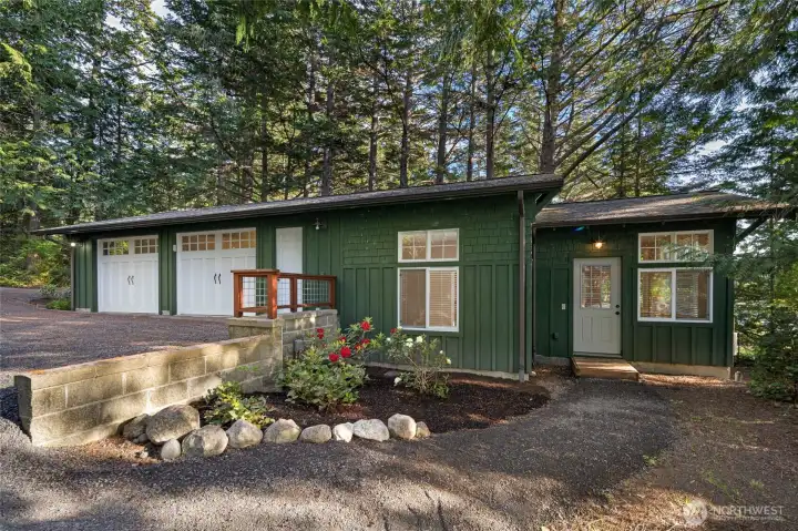 Detached 2 car garage with guest space.