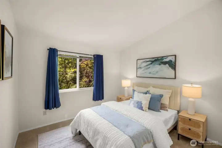 The generously sized second bedroom also has vaulted ceilings.