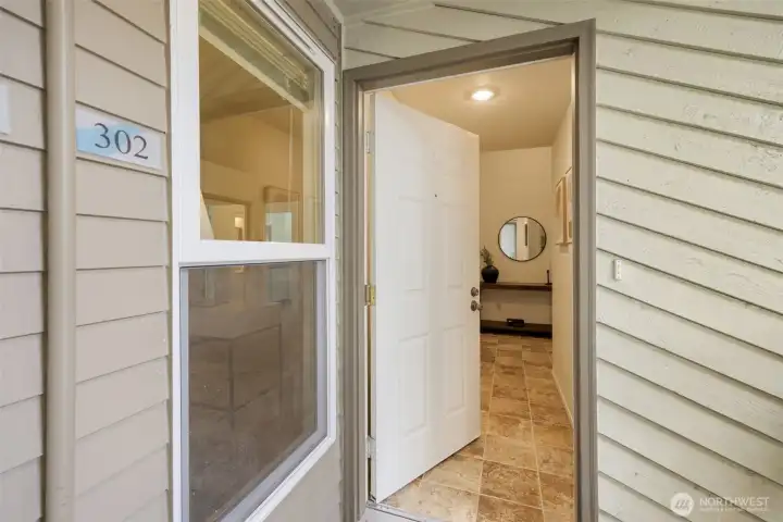 The entry to the home has a hallway that is separate from the living area.