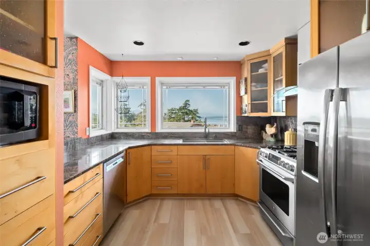 Kitchen with ample storage and view. Kitchen with ample storage and view.