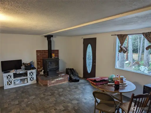 living area with wood stove