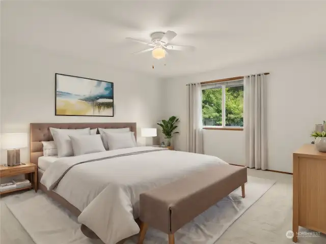 Your huge primary suite greets you with en-suite bathroom and walk in closet. Your primary bedroom faces the tranquil and private backyard. *Photo virtually staged*