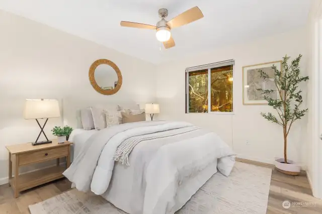 Primary bedroom, complete with new ceiling fan