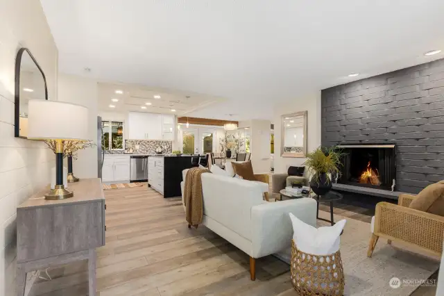 Amazing touches throughout this home.  Brand new fireplace, shiplap wall, new interior lighting and beautiful engineered hardwood floors