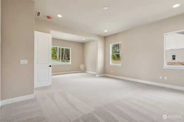 Lux primary bedroom with spacious sitting area