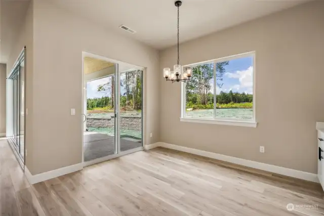 View from dining area through the slider to covered patio