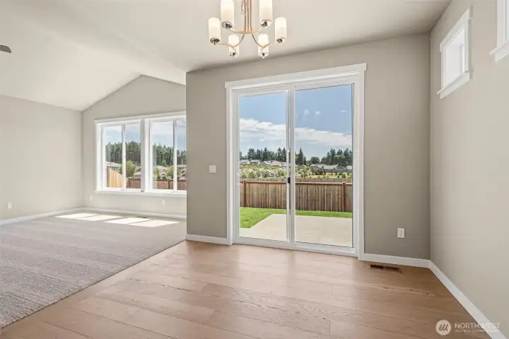 dDning room with slider door to backyard/patio area