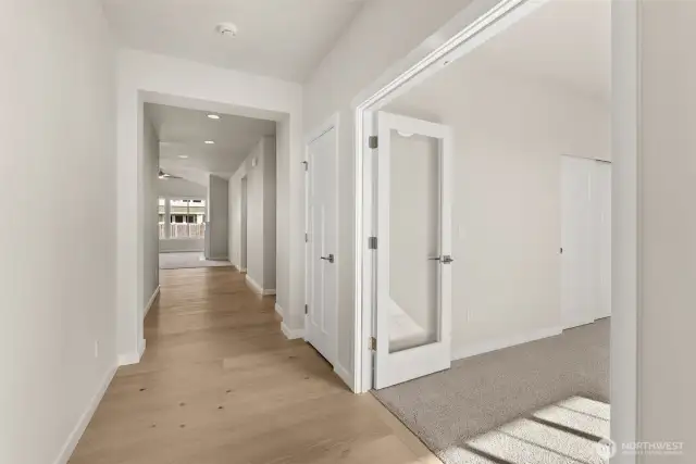 french doors open to 3rd bed/den
