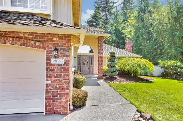 Manicured and well maintained landscaped yard