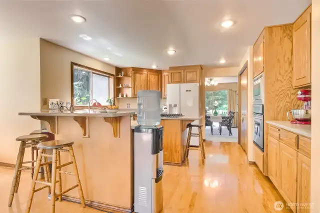 Kitchen with raised bar.  4 stools will stay