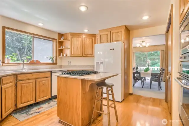 Kitchen opens to dining room