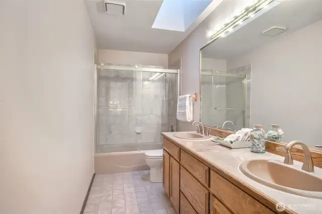 Hallway bath has 2 sinks