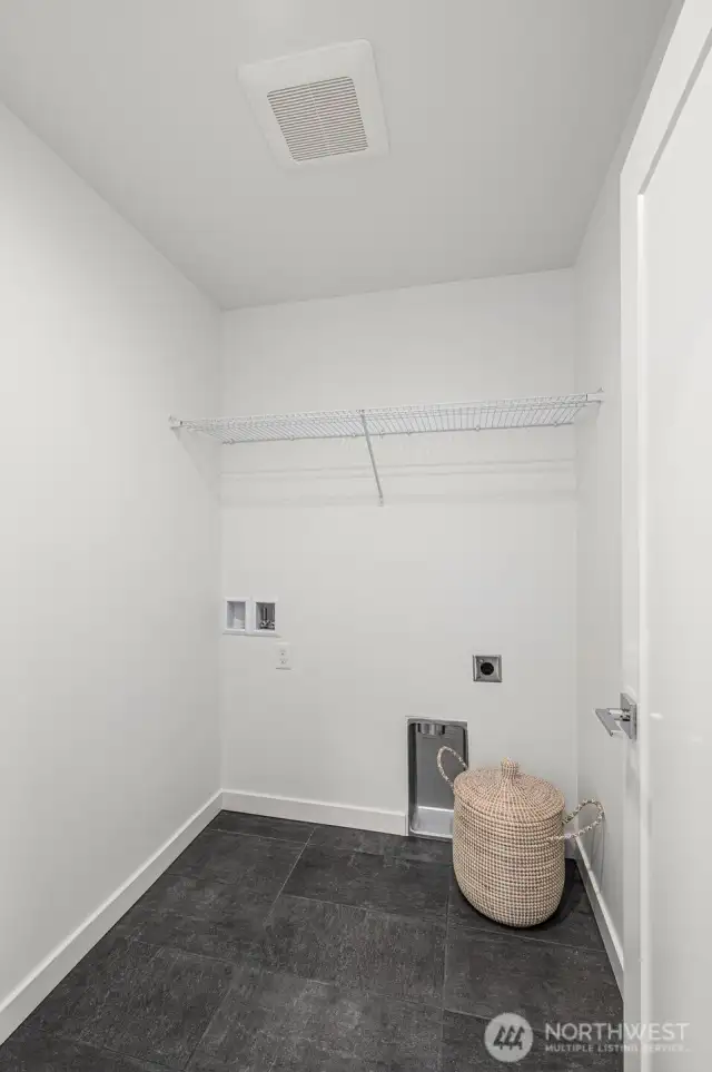 Side-by-side laundry tucked neatly, making everyday routines efficient.