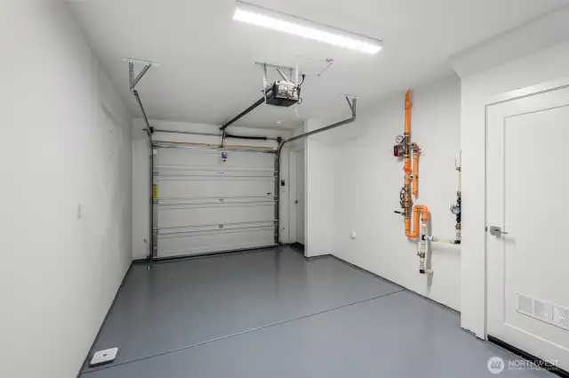 Your garage includes a 50-amp EV outlet and a heated flex room—perfect for a home gym, workshop, or extra storage. Practical and ready for your lifestyle.