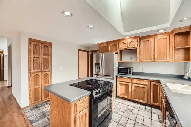 Kitchen with island for lots of kitchen workspace.
