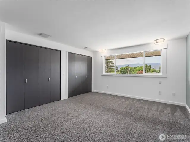 Plenty of closet space in primary bedroom.