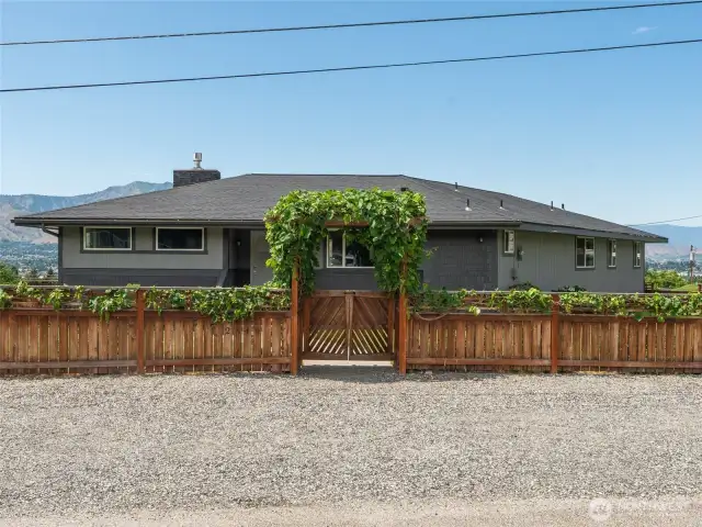 Additional parking at the entry enhances convenience without compromising front yard charm.
