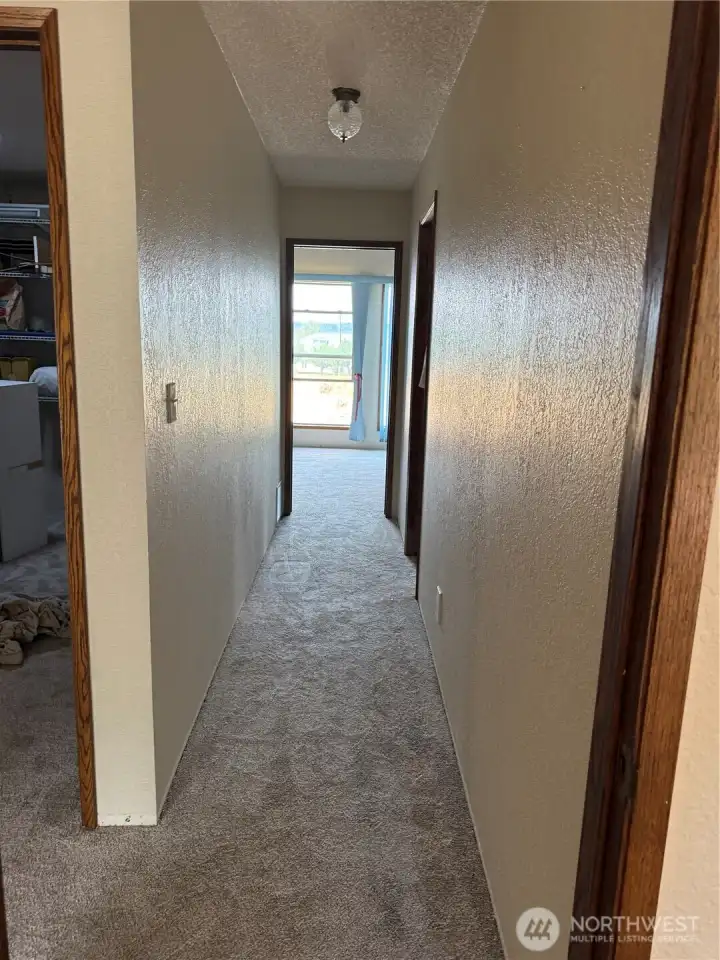 hallway to large extra room