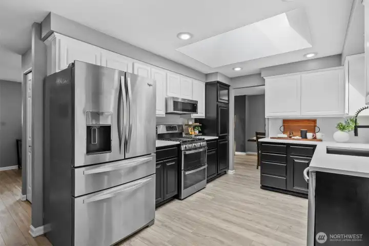 Contemporary finishes with like-new stainless steel appliances.