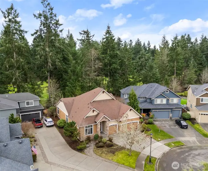 Wonderful rambler offers 3 bedrooms and 3.5 baths on the Woodlands golf course.  Low maintenance yard and lots of curb appeal.