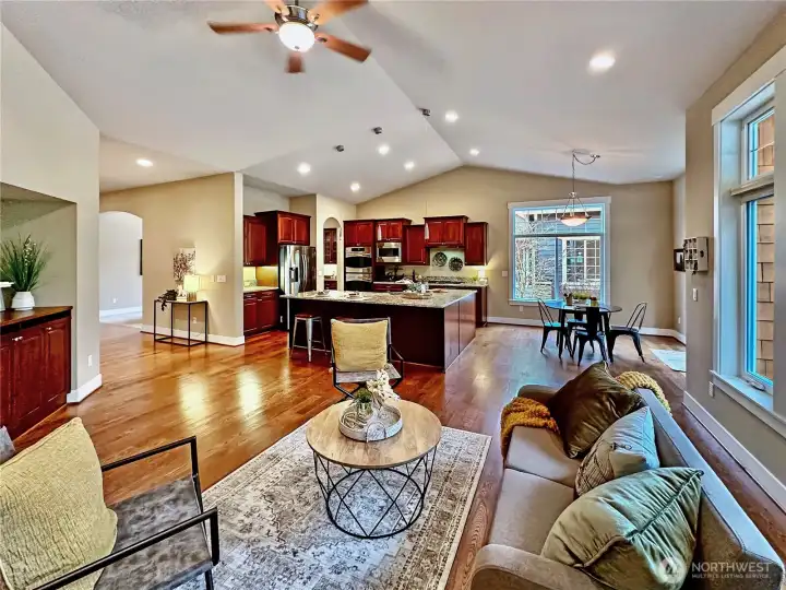 View of open great room looking towards kitchen and nook.